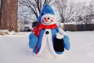 Snowman on snow background