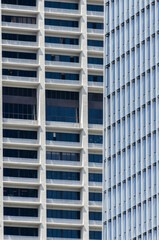 transparent glass wall of office building.Bright future, finance buildings seen from below