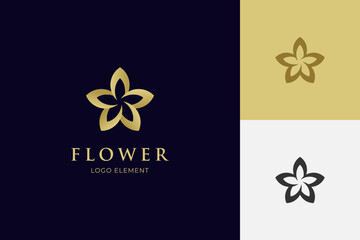elegant golden flower logo icon design element with star combined design concept for beauty, skin care, cosmetics brand logo symbol