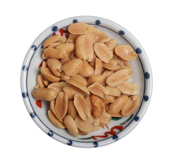 Peanuts in a cup on wooden background