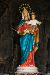 The beautiful statue of Mary Help of Christians in Monastery Salesian Don Bosco, Jakarta, Indonesia. - obrazy, fototapety, plakaty