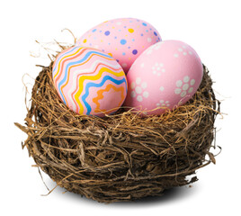 Colorfully painted easter egg in the nest