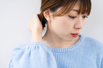 Fototapeta premium ニットを着た女性