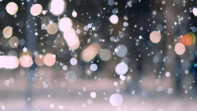 Abstract blurred night city background with bokeh spots of glowing lanterns and falling snow in winter. Winter, wintry, snowy, falling snow backdrop. Night city in winter. Looping seamless animation