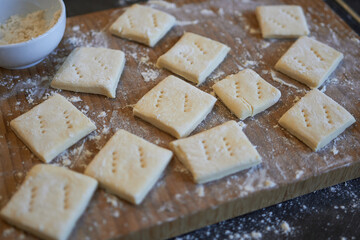 Making homemade cookies - crackers. Preparing cookies for baking.

