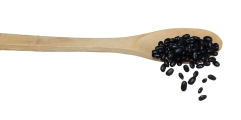 Black Bean fall, black grain beans explode abstract cloud fly from wooden spoon. Beautiful complete seed pea bean, food object design. Selective focus freeze shot white background isolated