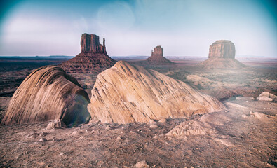 Beautiful sunset over the West, Mitten and East Butte in Monument Valley. Utah, USA.