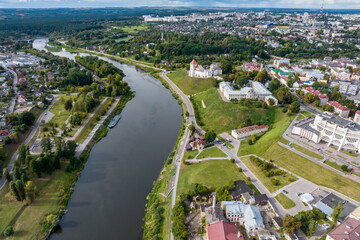 aerial panoramic view from great height on red roofs of old big city