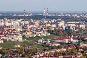 aerial panoramic view from great height on red roofs of old big city