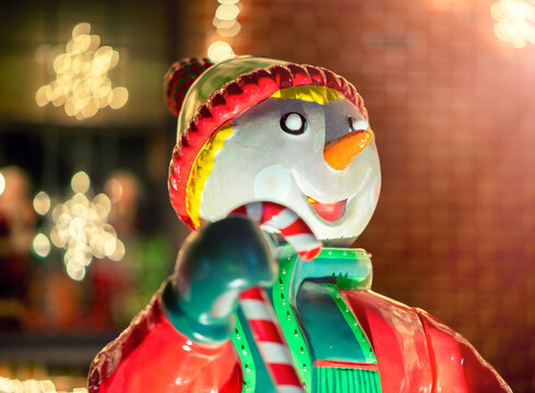 Snowman puppet at night in Dyker Heights, New York City - USA.
