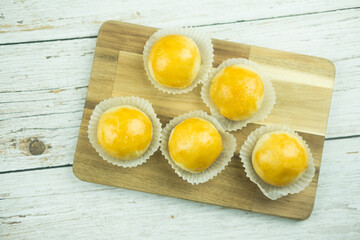 Delicious Chinese pastry filled with mung bean paste and salted egg yolk. Top view