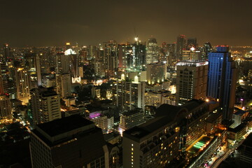 Building city at night aerial view 