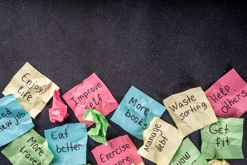 New year goals or resolutions on bright colorful paper stickers. New Year goals List 2023, plan...