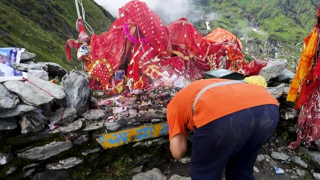 July 14th 2022, Himachal Pradesh India. Devotees offering their prayers at Goddess Kali, a Hindu deity worship place at Kali top. Shrikhand Mahadev Kailash Yatra in the Himalayas.