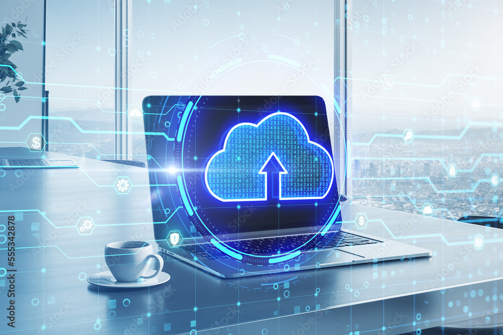 Poster close up of desktop with laptop, coffee cup and glowing cloud hologram on blurry office background w