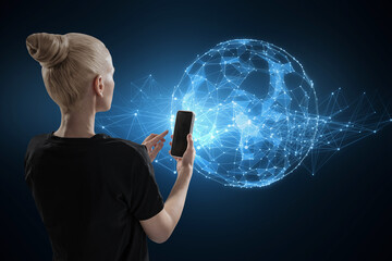 woman using cellphone with glowing polygonal sphere on blurry dark background. Futuristic technology wireframe mesh polygonal element. Connection Structure. 