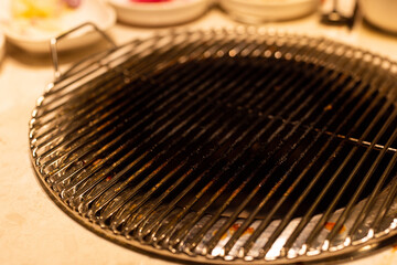 A blackened iron grill