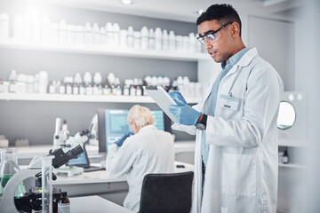 Scientist, tablet and research innovation in laboratory for medical analytics, science development or biotech neuroscience. Pharmaceutical data, doctor and pharmacy engineer working in clinic lab