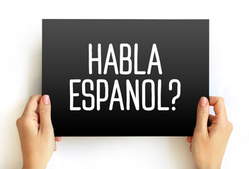 Habla Espanol? text on card, concept background