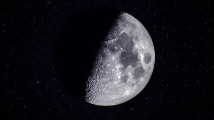 Big beautiful moon with big craters close up with starry sky at night