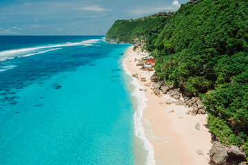 Aerial view of luxury beach with blue ocean in Bali