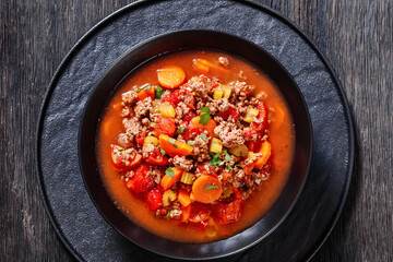 Hamburger Soup with barley and vegetables in bowl