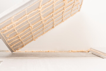 Sheet of styrofoam in foam for gluing it to the floor. Warming concrete floor with styrofoam in...
