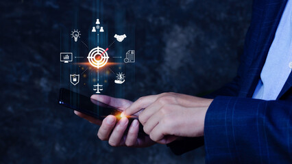 Hand pointing icon virtual screen on smart phone of Digital target marketing advertising and sales increase business technology concept, online marketing, E-business, Ecommerce, Business online.