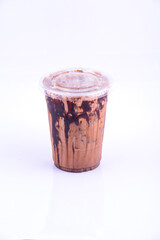 Mocha latte. Beverage for summer with brick wall background.