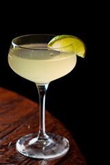 tasty cocktail on the wooden background