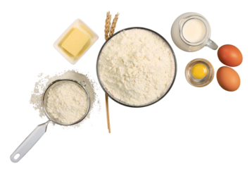 Collection of baking ingredients, flour, milk and eggs