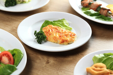 a host of delicious dishes on the table in children's restaurant