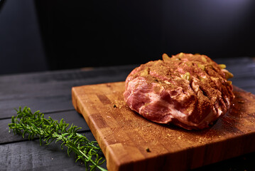 Meat with spices ready for baking in the oven. Cooking meat