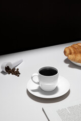 cup of coffee and croissant