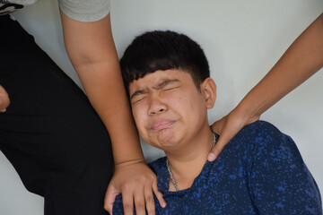 Southeast Asian boy quarreling and fighting, fighting between friends, misunderstandings and mutual...