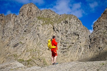 A man hikes the trail to Balcon de Pineta, a popular route in the Spanish Pyrenees