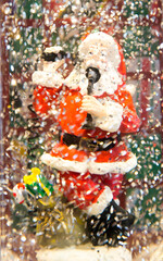 Santa decoration with glitter snow