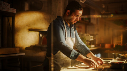 In Restaurant Professional Chef Preparing Pizza, Tenderly Working, Kneading Dough, Adding Ingredients, Special Sauce, Traditional Family Recipe. Authentic Pizzeria with Deliciously Tasty Organic Food