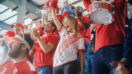 Sport Stadium Big Event: Crowd of Fans Cheer for Red Soccer Team to Win. People Celebrate Scoring a...