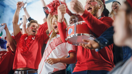 Sport Stadium Big Event: Crowd of Fans Cheer for Red Soccer Team to Win. People Celebrate Scoring a...