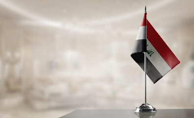 A small Iraq flag on an abstract blurry background