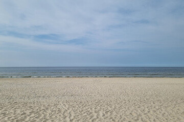 The sandy coast of the Baltic Sea. Rest on the sea.