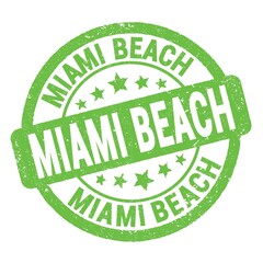 MIAMI BEACH text written on green round stamp sign.