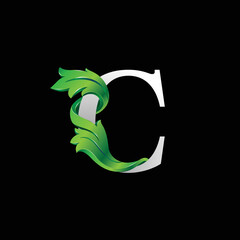 Initial letter C, 3D luxury green leaf overlapping white serif font on black background