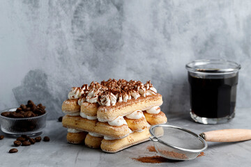 Unbaked Tiramisu on Grey Cement Background