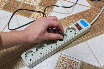 connect the pluging to the extension cord,connect the electric wire to the outlet, electricity...