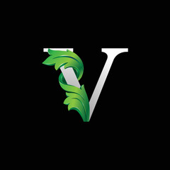 Initial letter V, 3D luxury green leaf overlapping white serif font on black background