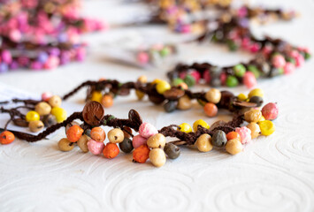 necklace made in the form of a flower motif from materials of various colors