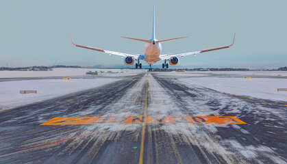 White passenger airplane landing runway on snowy airport - Oslo, Norway - obrazy, fototapety, plakaty