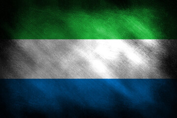 The flag of Sierra Leone on a retro background